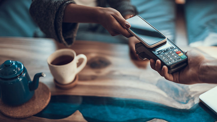 Using a smartphone to make a mobile payment.